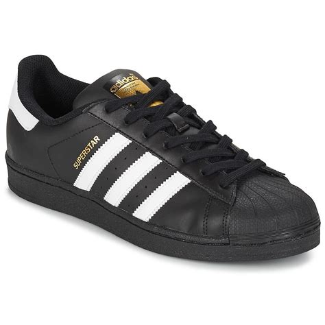 witte adidas schoenen met zwarte strepen